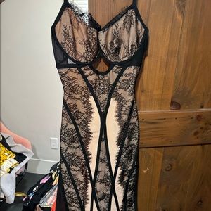 Fashion nova lace black and nude body con dress with open back